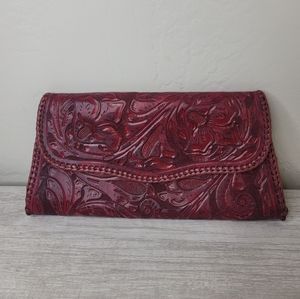 Christiansen burgundy tool leathered clutch